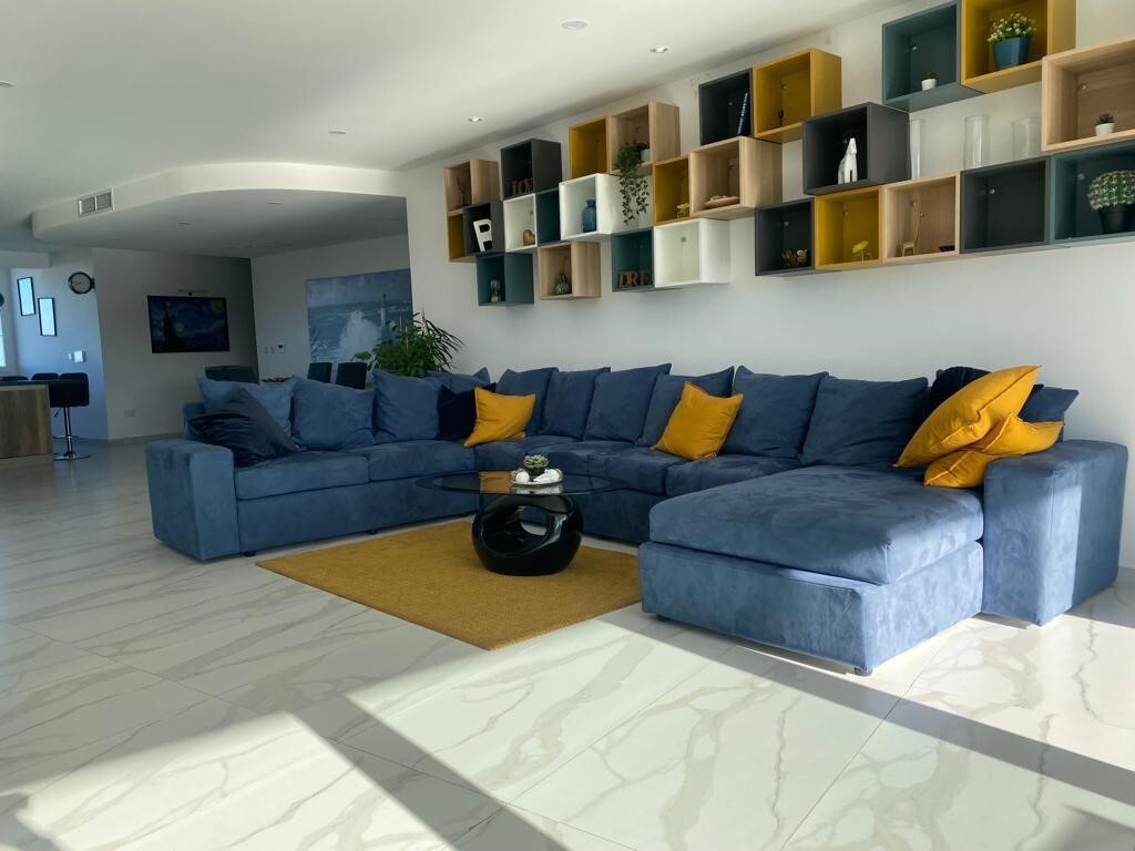 San_Gwann_apartment_to_let-large_living_area-oyster_christies