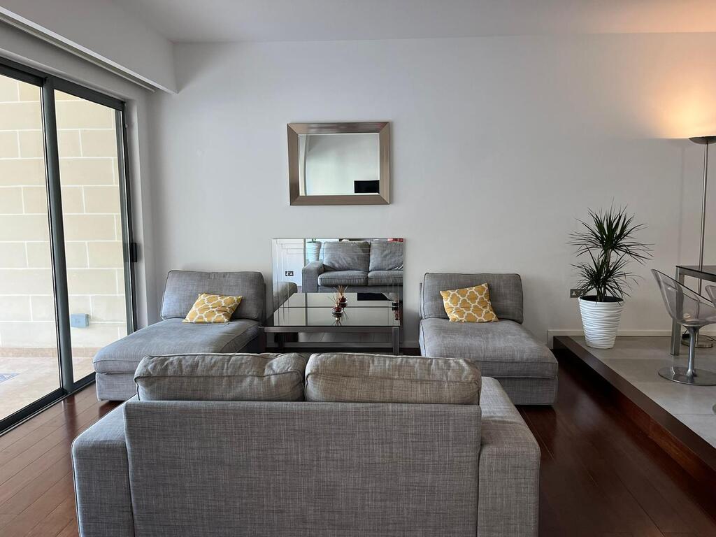 St.Julians-apartment-for-sale-living-area-oyster-christies