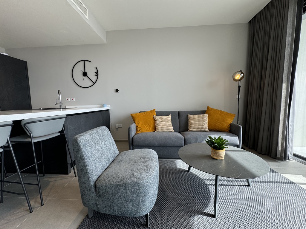 Mercury-tower-apartment-to-let-living-area-oyster-christies